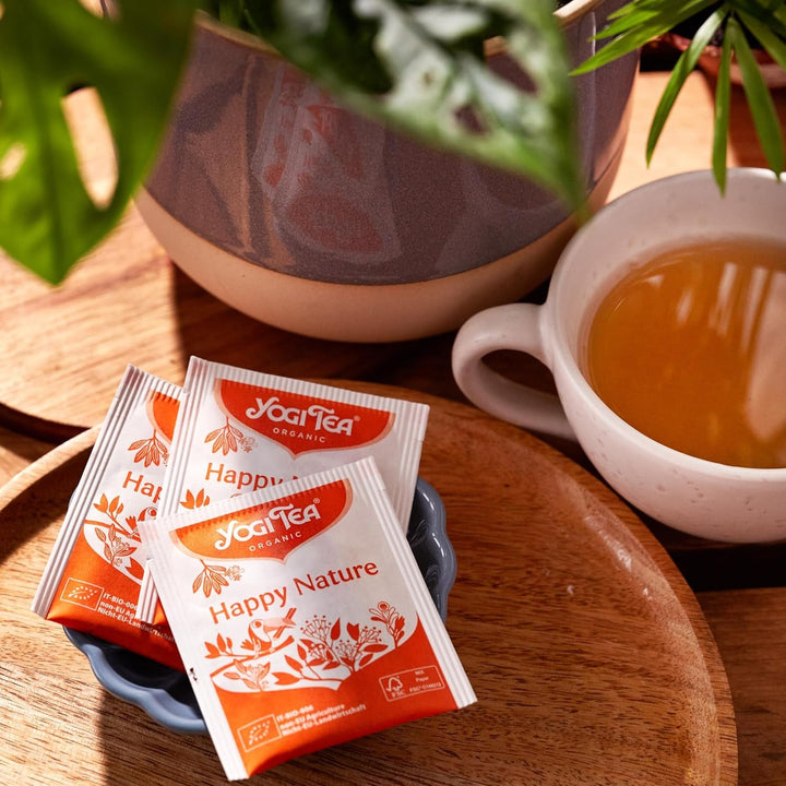 Yogi Tea - Happy Nature, Buy One and Do Good, ceai ayurvedic organic cu mirodenii și plante, amestec de mango, mandarină și vanilie, Yogi Tea pachet de 6, 6X17 pliculețe (102 pliculețe de ceai în total)