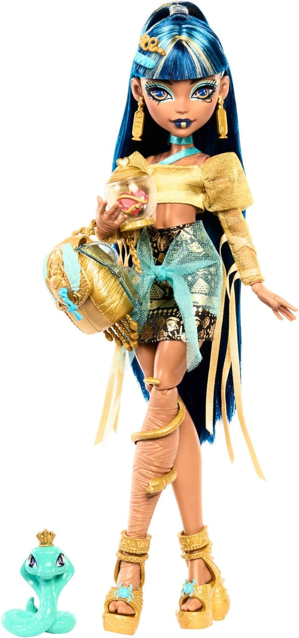 Păpușă Monster High Cleo De Nile în bluză aurie și fustă stratificată, include animal de companie Cobra Hissette și accesorii precum rucsac, gustare și rolă de hârtie, HXH74 Papusi Naty Shop Cobra Hissette