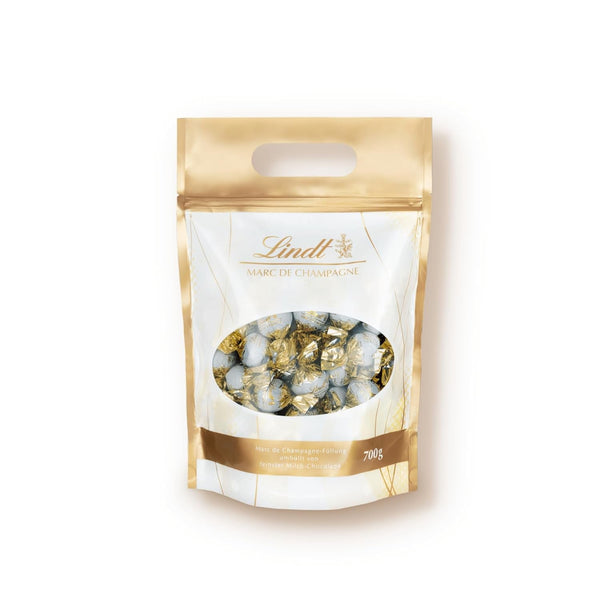 Lindt Marc De Champagne, 56 de ciocolate cu lapte integral, cu umpluturi rafinate, care conțin alcool, 70 grame Bomboane de Ciocolata Naty Shop