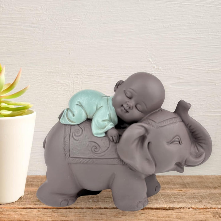 Zen'Light Statue Buddha Bonze Sleeping on Elephant - Atmosferă Zen în spațiul tău sacru - frumoasă figură de bun augur -H 9.5 cm, Brown & Green Statuete si sculpturi Naty Shop
