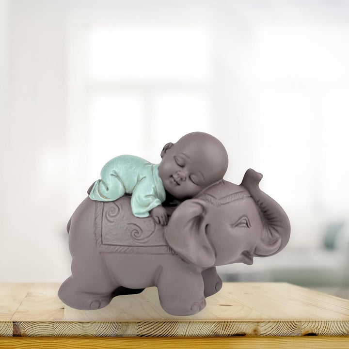 Zen'Light Statue Buddha Bonze Sleeping on Elephant - Atmosferă Zen în spațiul tău sacru - frumoasă figură de bun augur -H 9.5 cm, Brown & Green Statuete si sculpturi Naty Shop